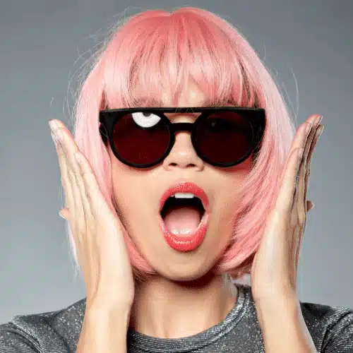 Pink Bob with a girl wearing sunglasses - HairZglam